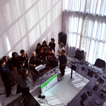 Overhead view of the workshop set up in the Pavillion's white gallery space