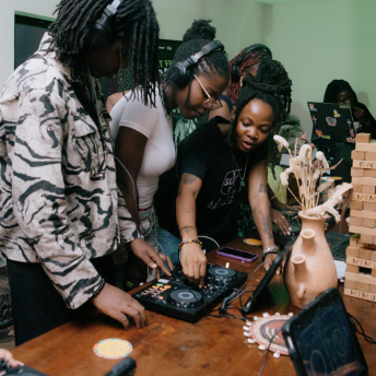 Attendees taking turns on a controller during the session