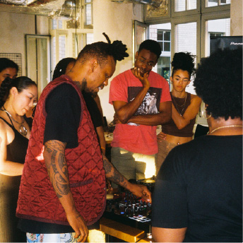 Attendees watching a demonstration