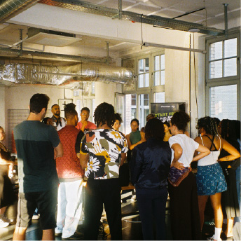 Attendees dancing at the showcase