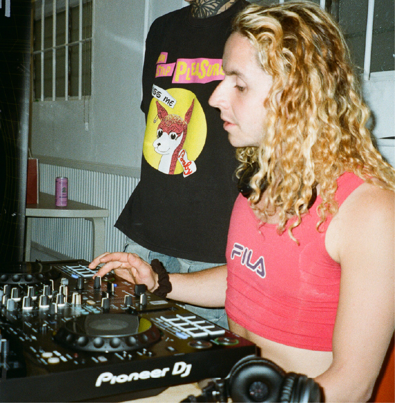 Attendee learning on a Pioneer DJ controller
